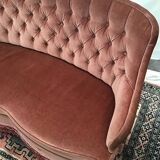 Pale pink tufted back toad sofa