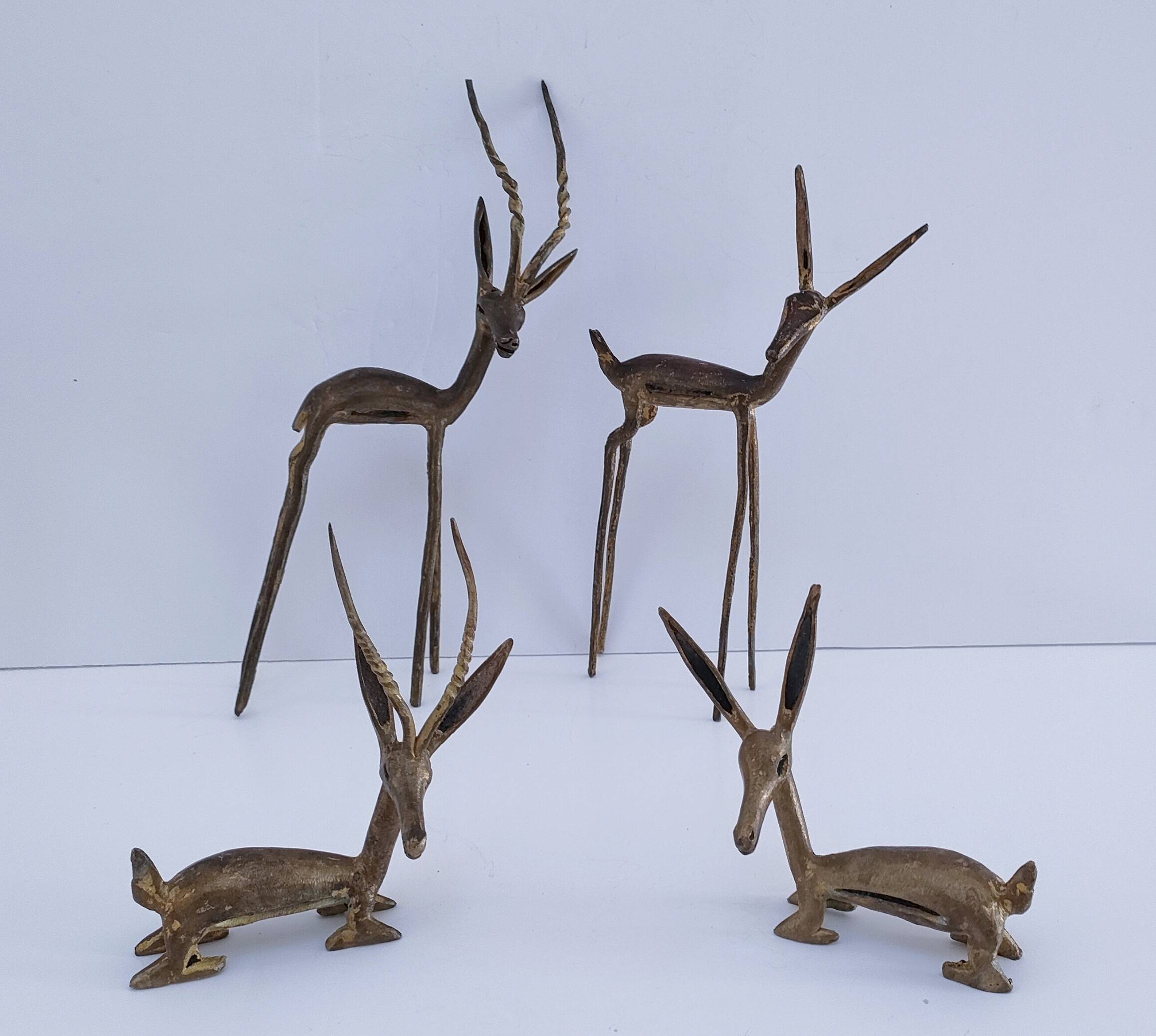 four vintage brass gazelle antelope sculptures