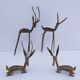 four vintage brass gazelle antelope sculptures
