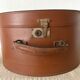 Old hat box and its key from the 1930s