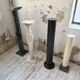 Set of 4 marble columns or pedestals.