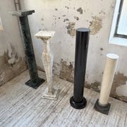 Set of 4 marble columns or pedestals.