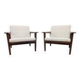 Paire de fauteuils modernistes en teck, France vers 1950