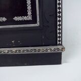 Antique wooden cabinet painted in black and with incised white painted decorations, Ettore Zaccari, Italy c 1910