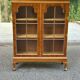 Chippendale display cabinet in wood, English Queen Anne dresser bookcase from 1960.