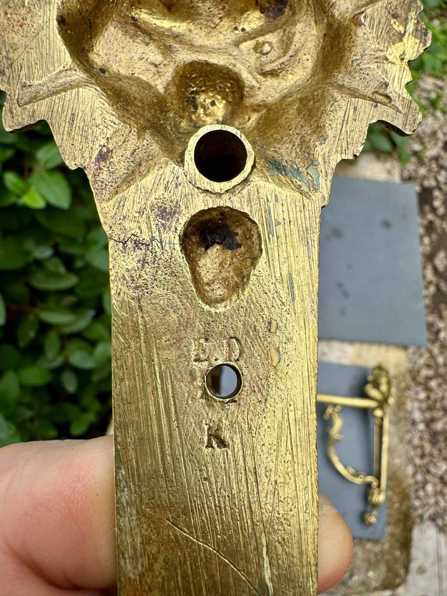2 brass lion Empire wall sconces