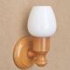 Pair of pine wood and white glass wall lights, 1970s