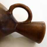 Pair of stoneware pitchers and vases