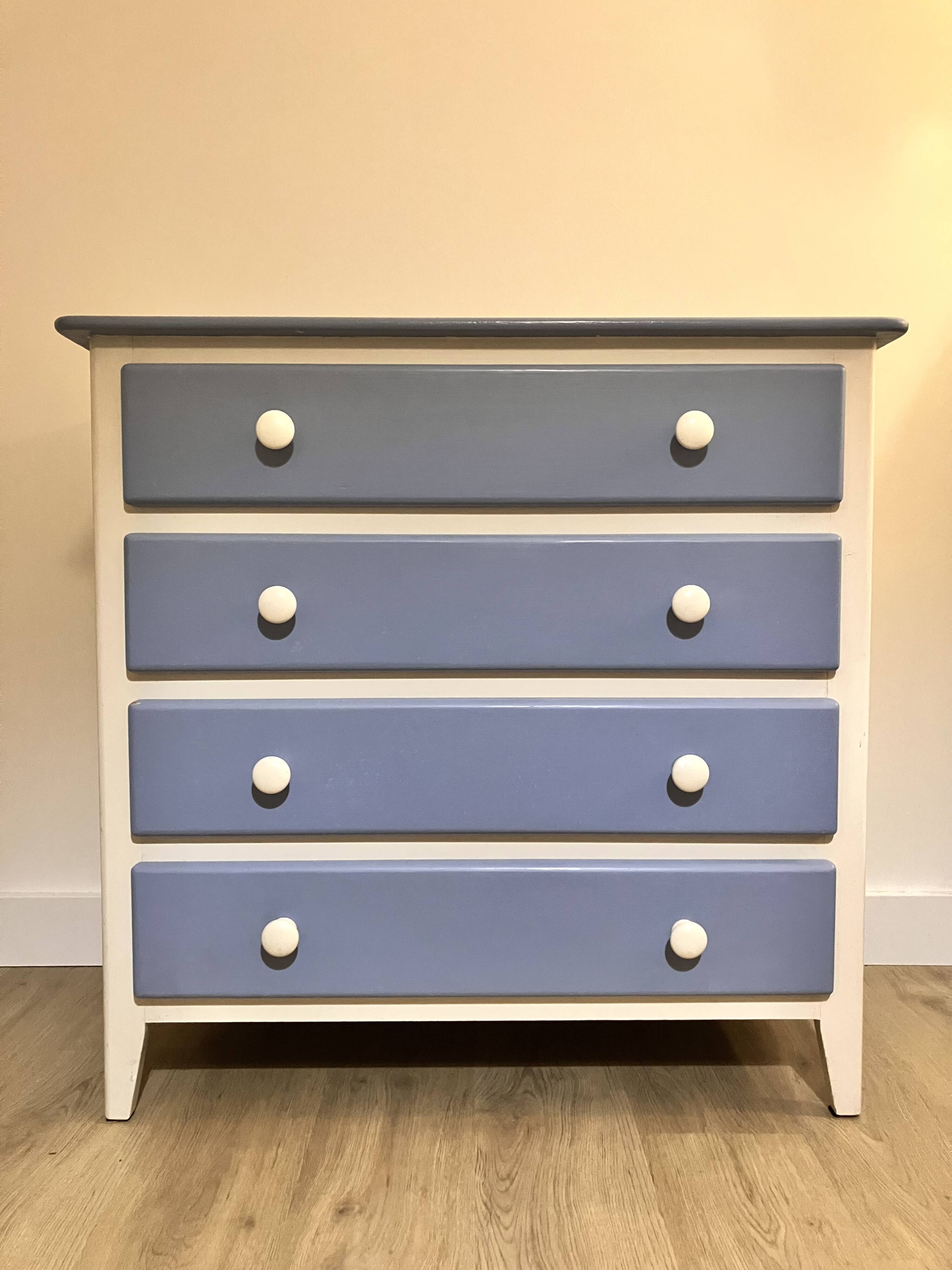 Wooden chest of drawers with tapered legs