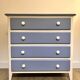 Wooden chest of drawers with tapered legs