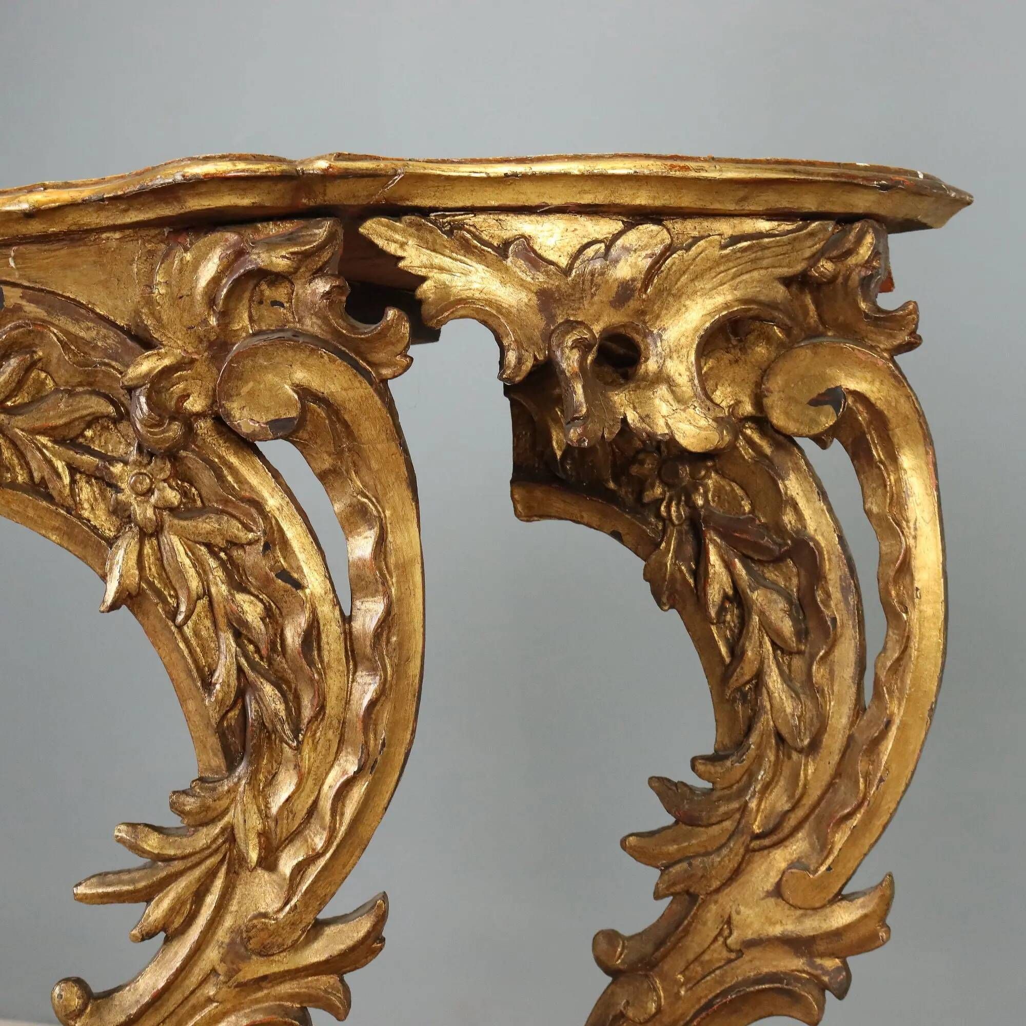 Old eclectic console carved in gilded fir, Italy 19th century