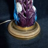 Large table lamp with earthenware peacock and beige silk lampshade