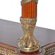 Console topped with an Empire-style mirror.