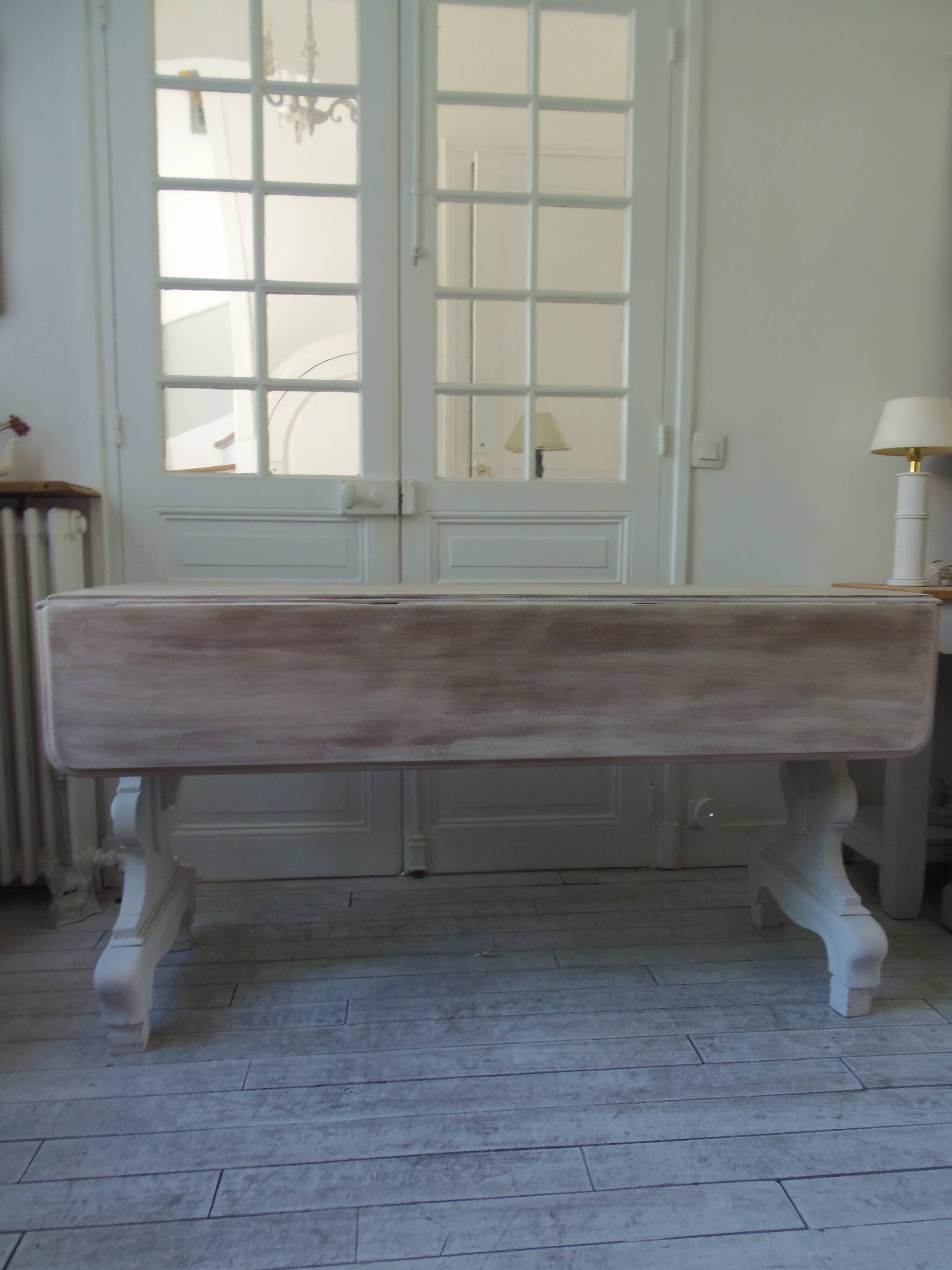 Console, solid walnut table, foldable extensions, grey patinated legs.