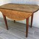 Table ronde à 2 rabats en bois vintage