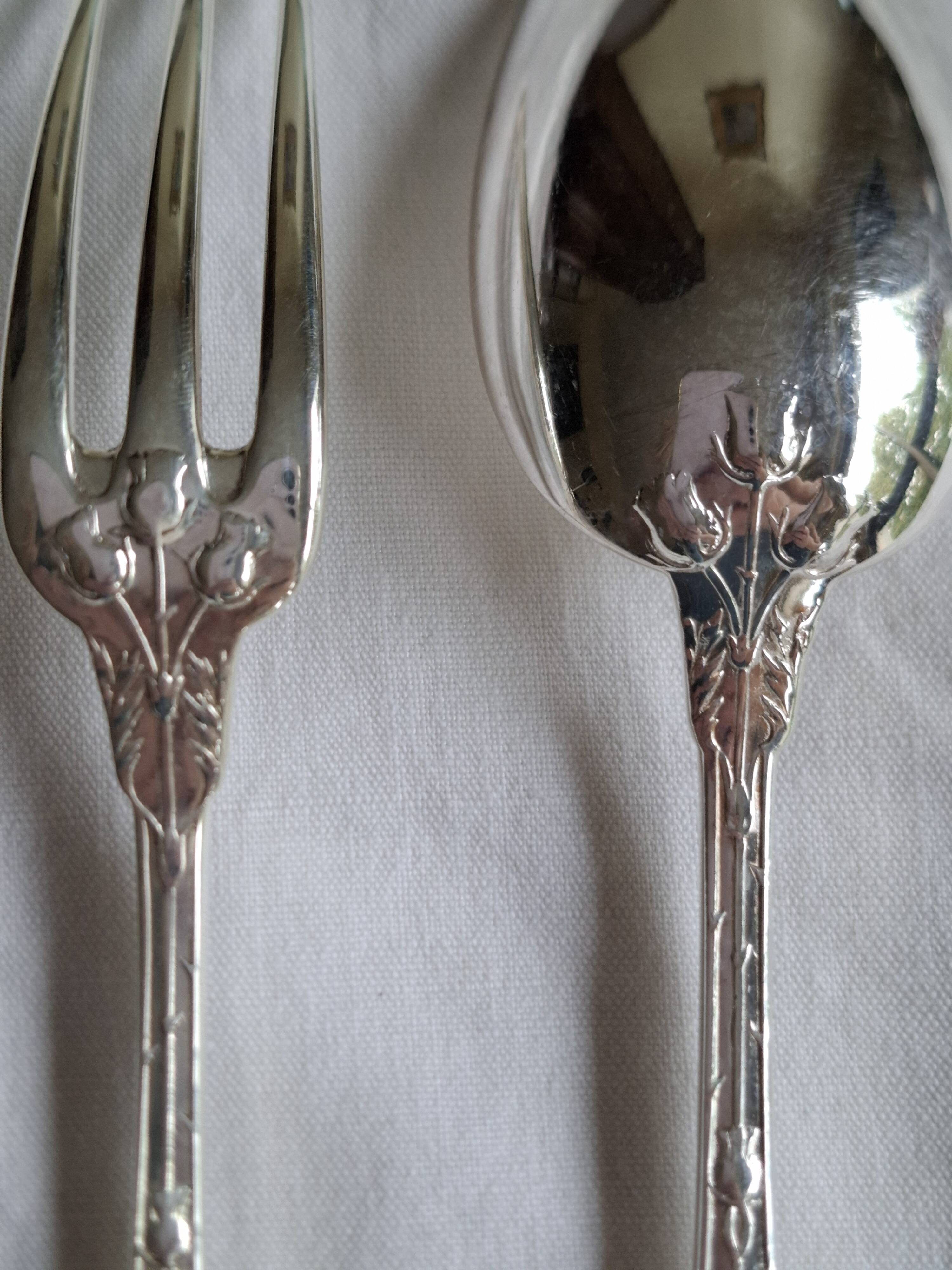 12 Art Nouveau silver-plated cutlery sets with thistle motifs
