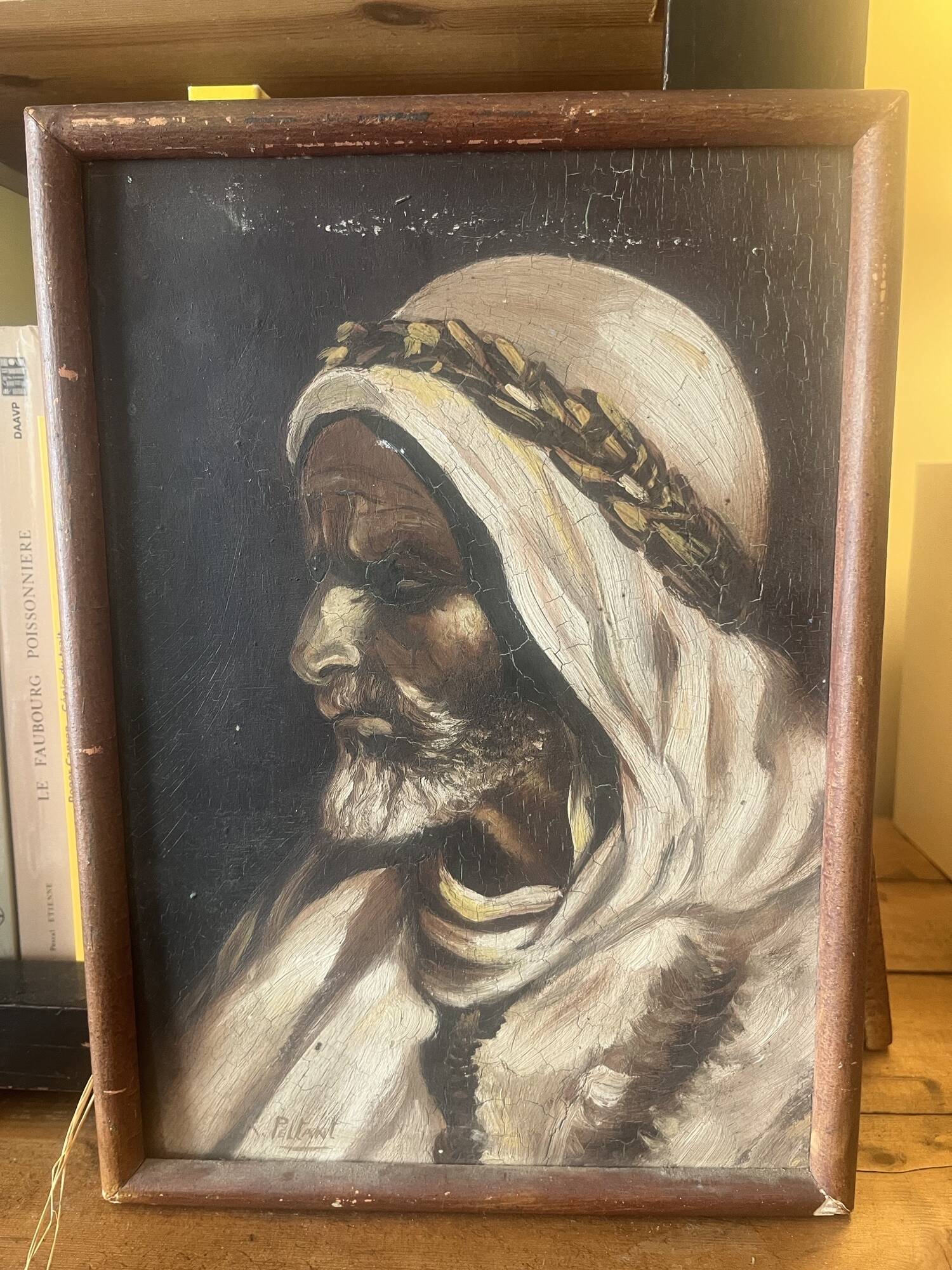 Orientalist painting of an Arab man.