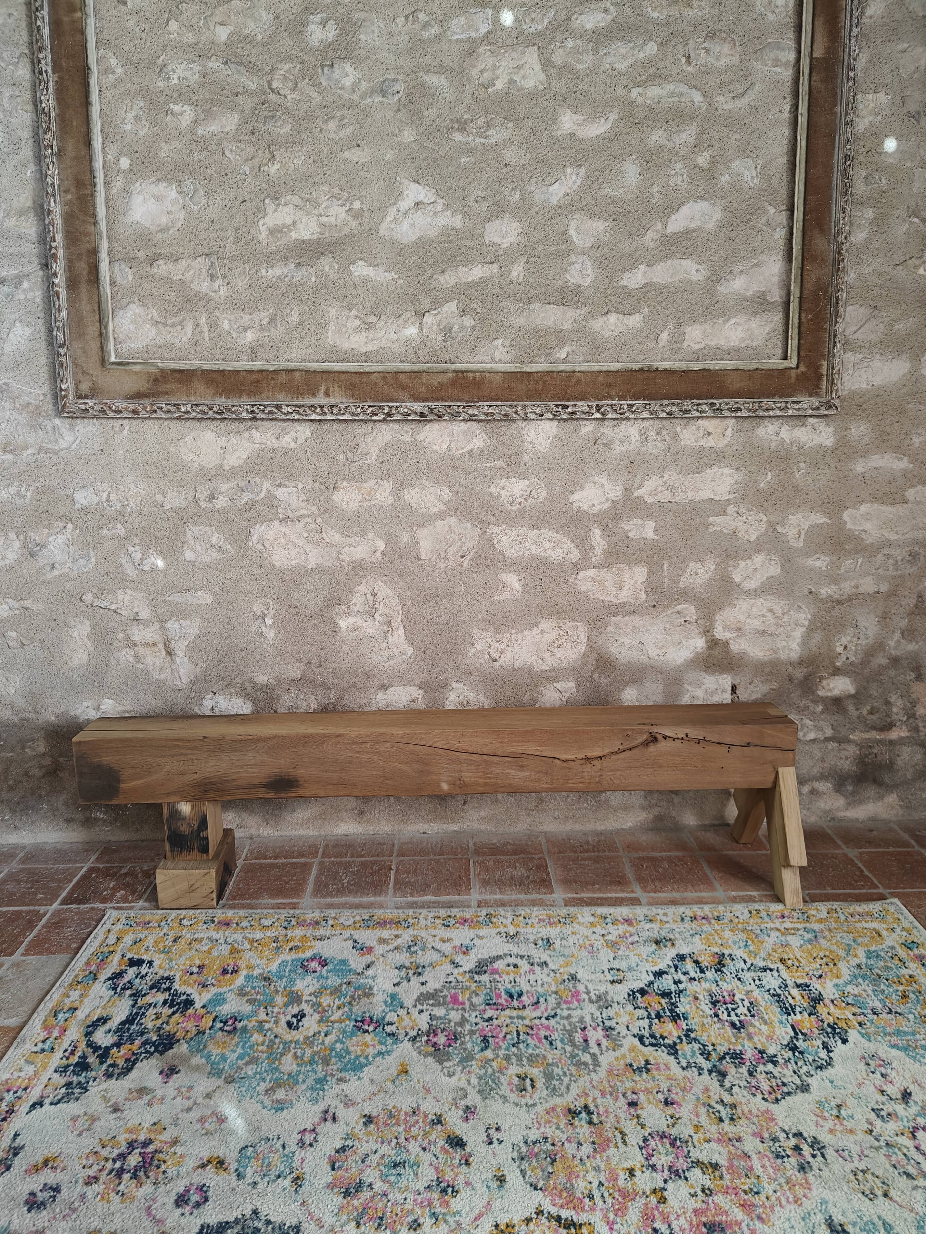 Solid oak bench with asymmetrical legs