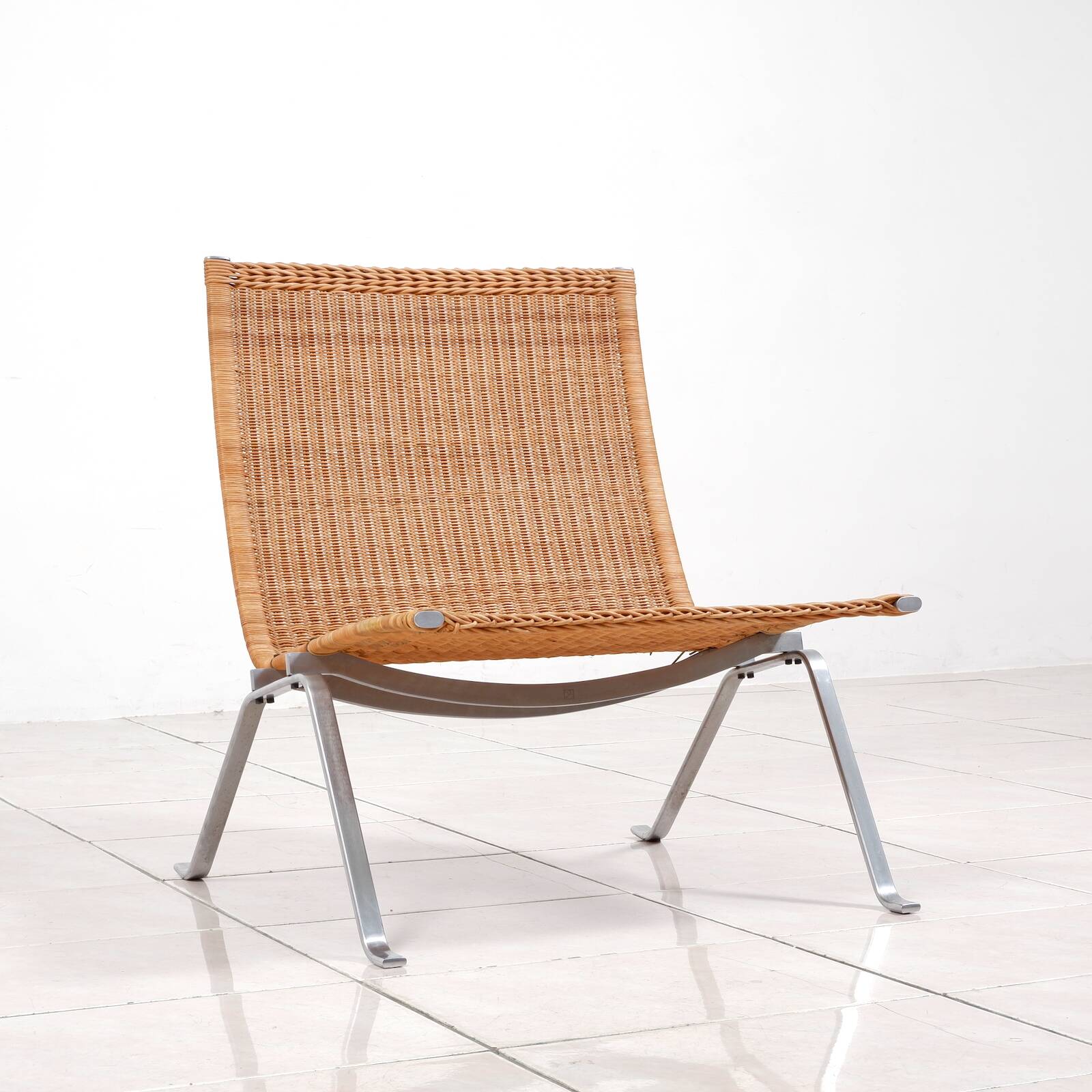 PK 22“ lounge chair in rattan by Poul Kjaerholm for E. Kold Christensen
