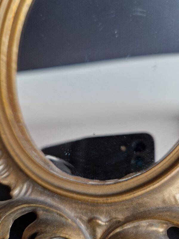 Pair of gilded rococo style mirrors, 1970s