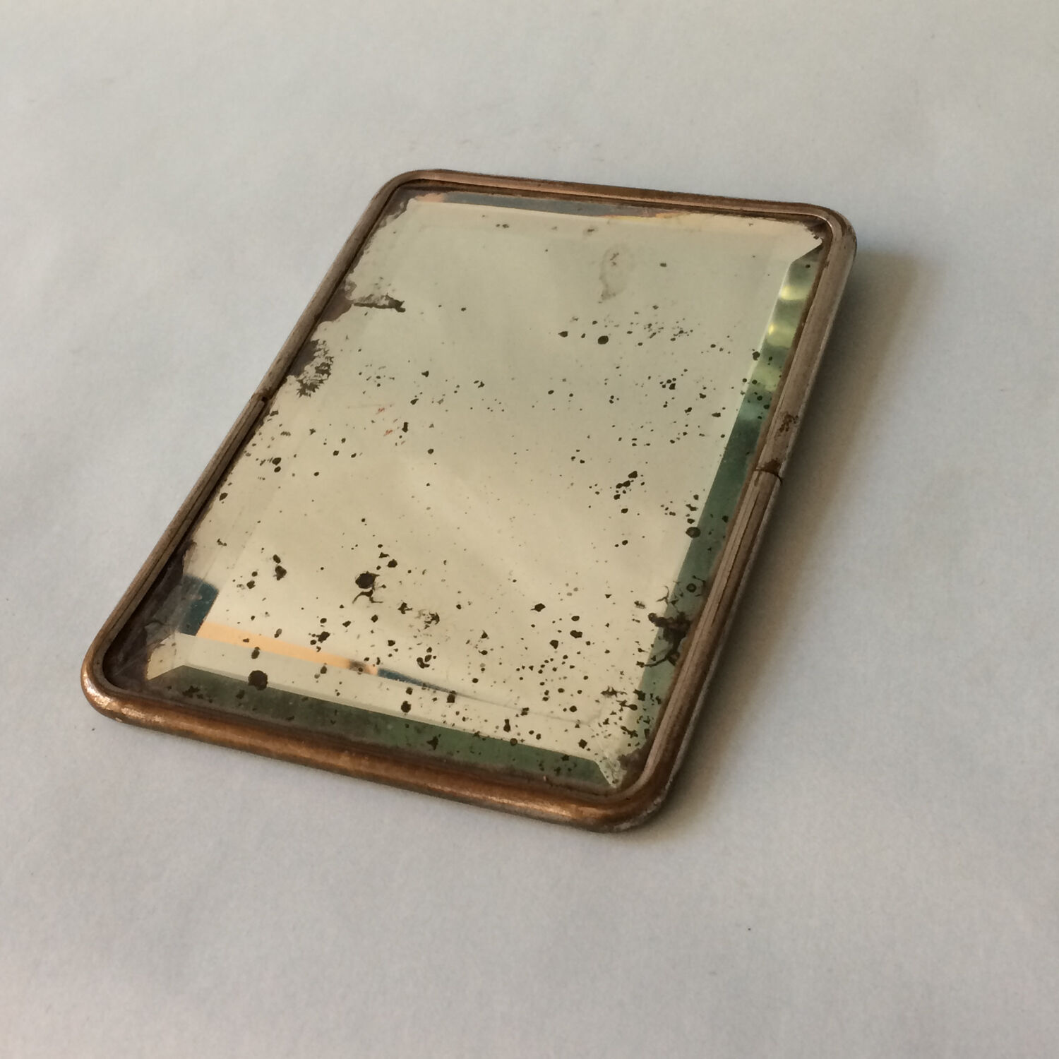 Beveled travel mirror