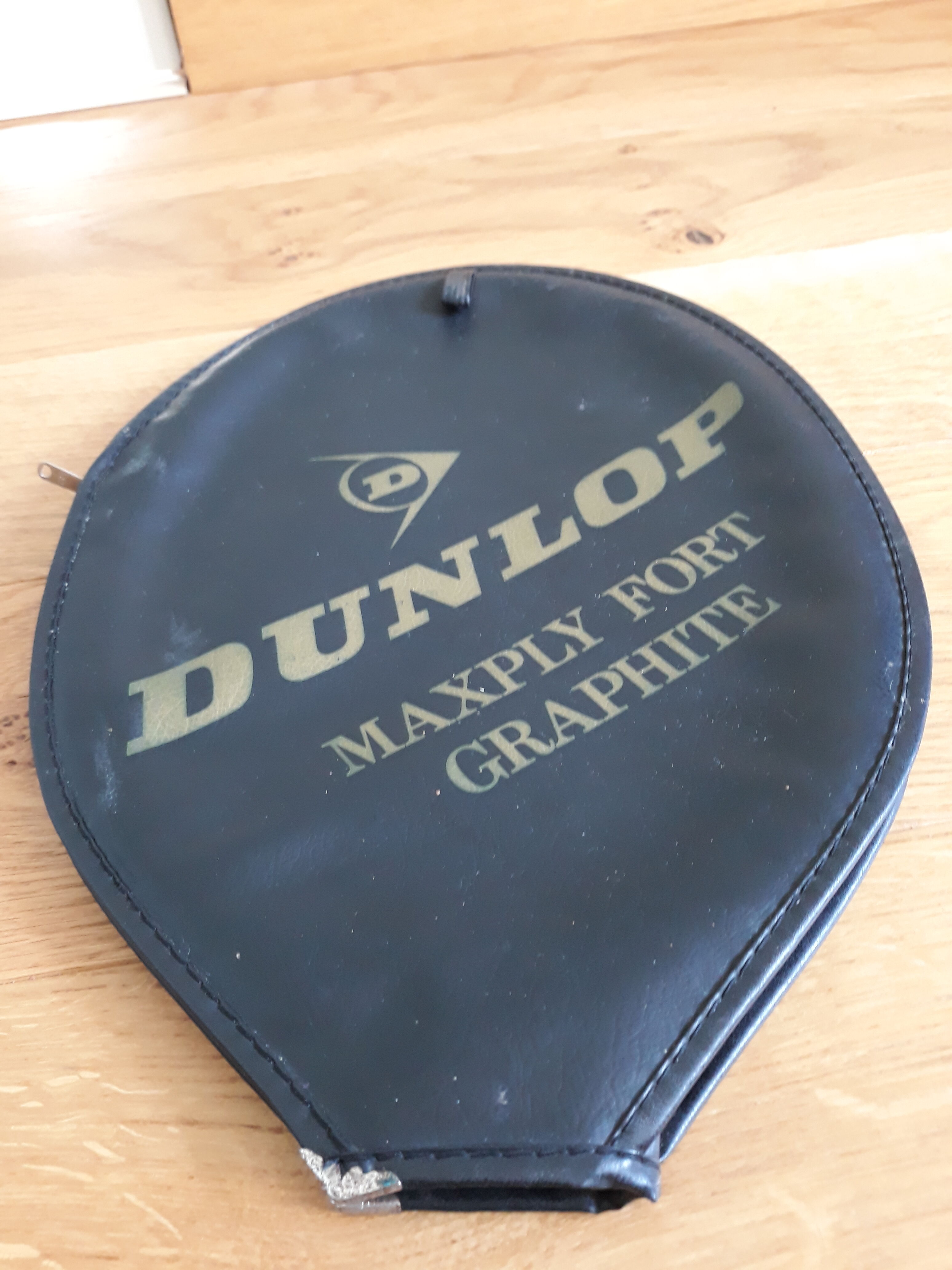 Wooden Dunlop tennis racket with its cover
