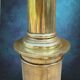 Large vintage brass lamp base in neoclassical column style with a copper socket.
