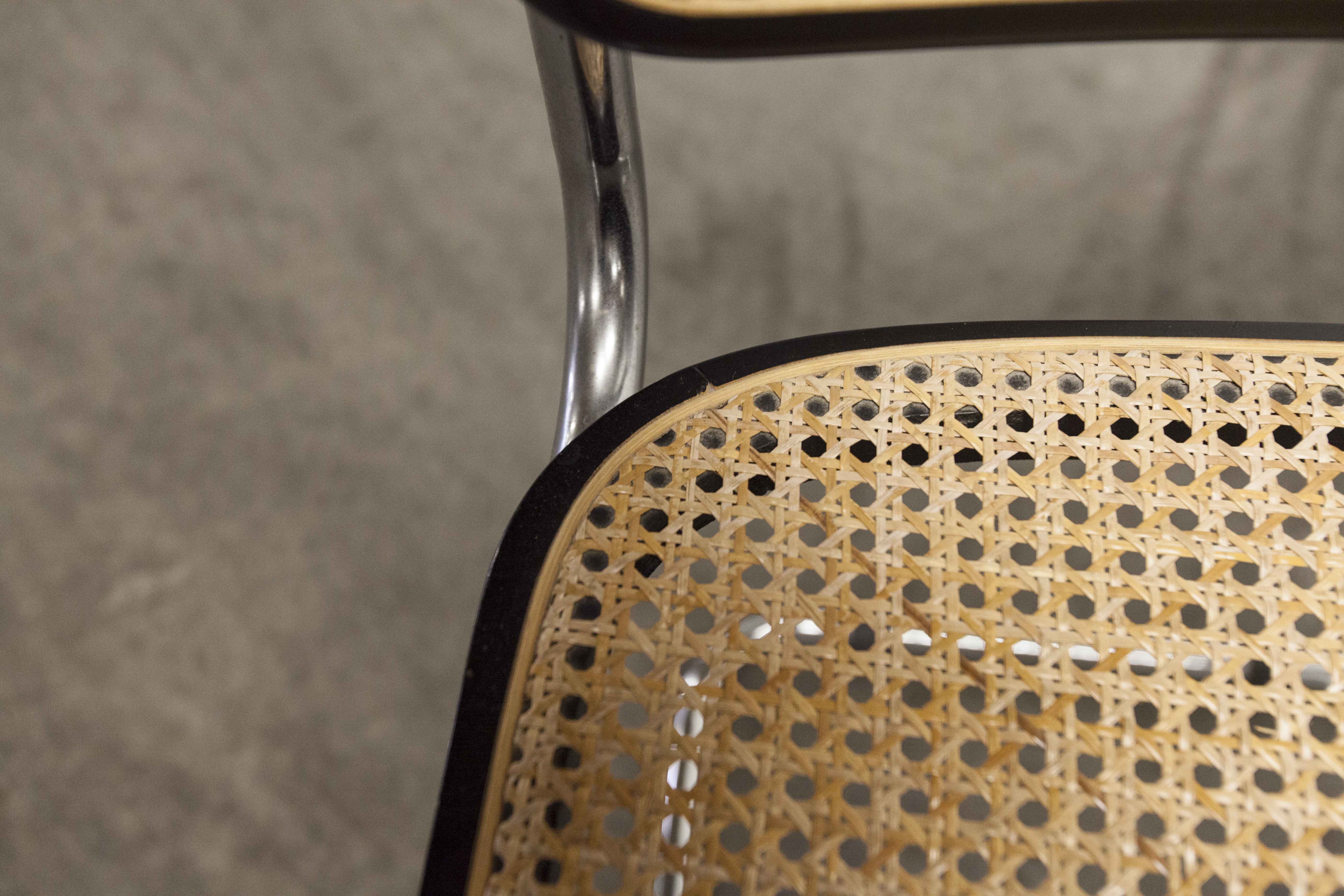 Pair of black Breuer b32 chairs and cannage