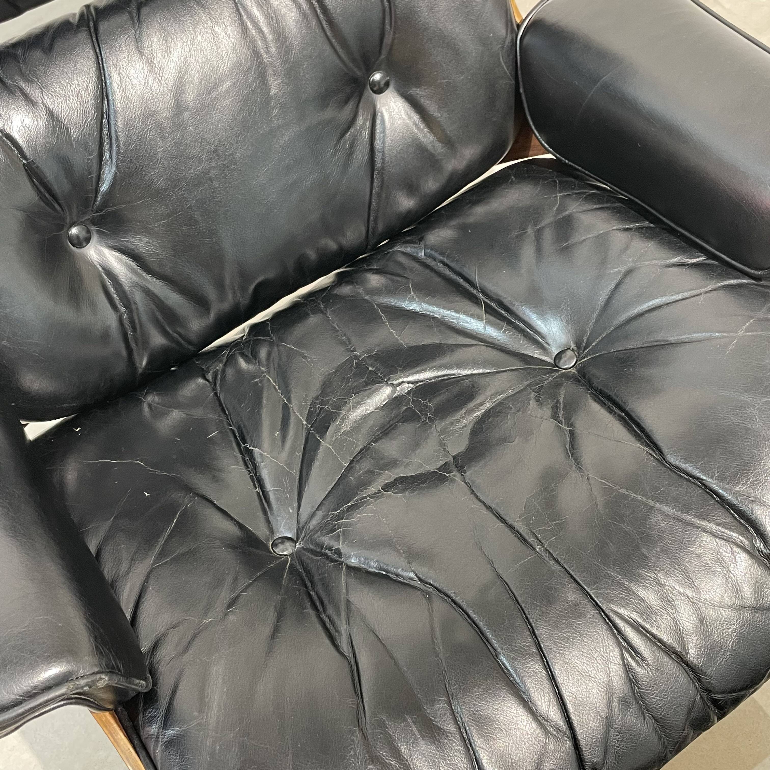 Vintage armchair with ottoman in Rio rosewood by Charles and Ray Eames, 1970s