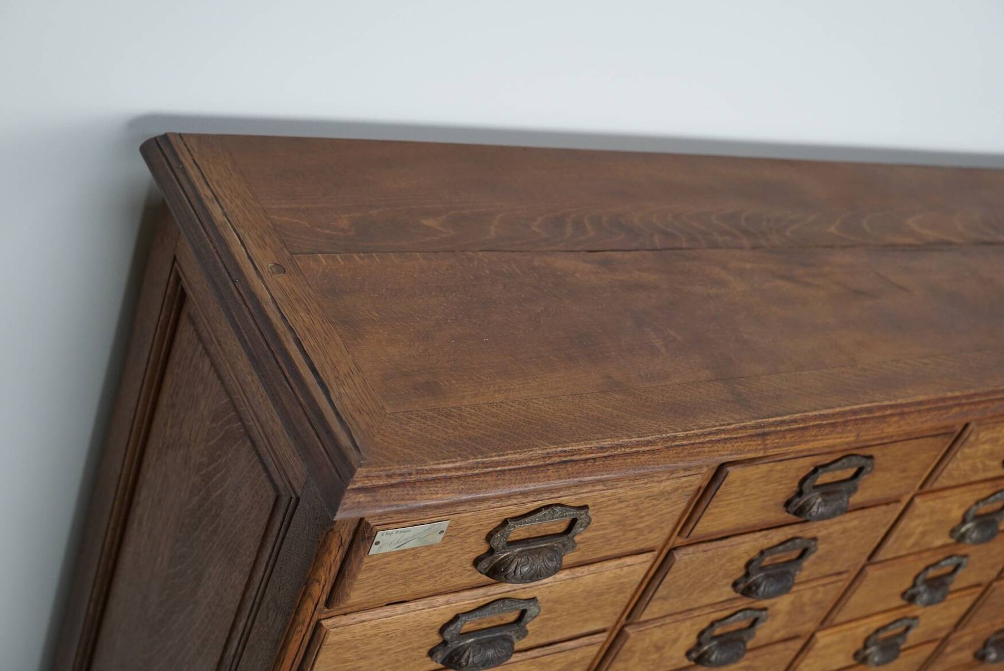 Antique French oak filing / apothecary cabinet by Chouanard, ca 1910