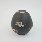 Small black ceramic vase with abstract fish and wave pattern
