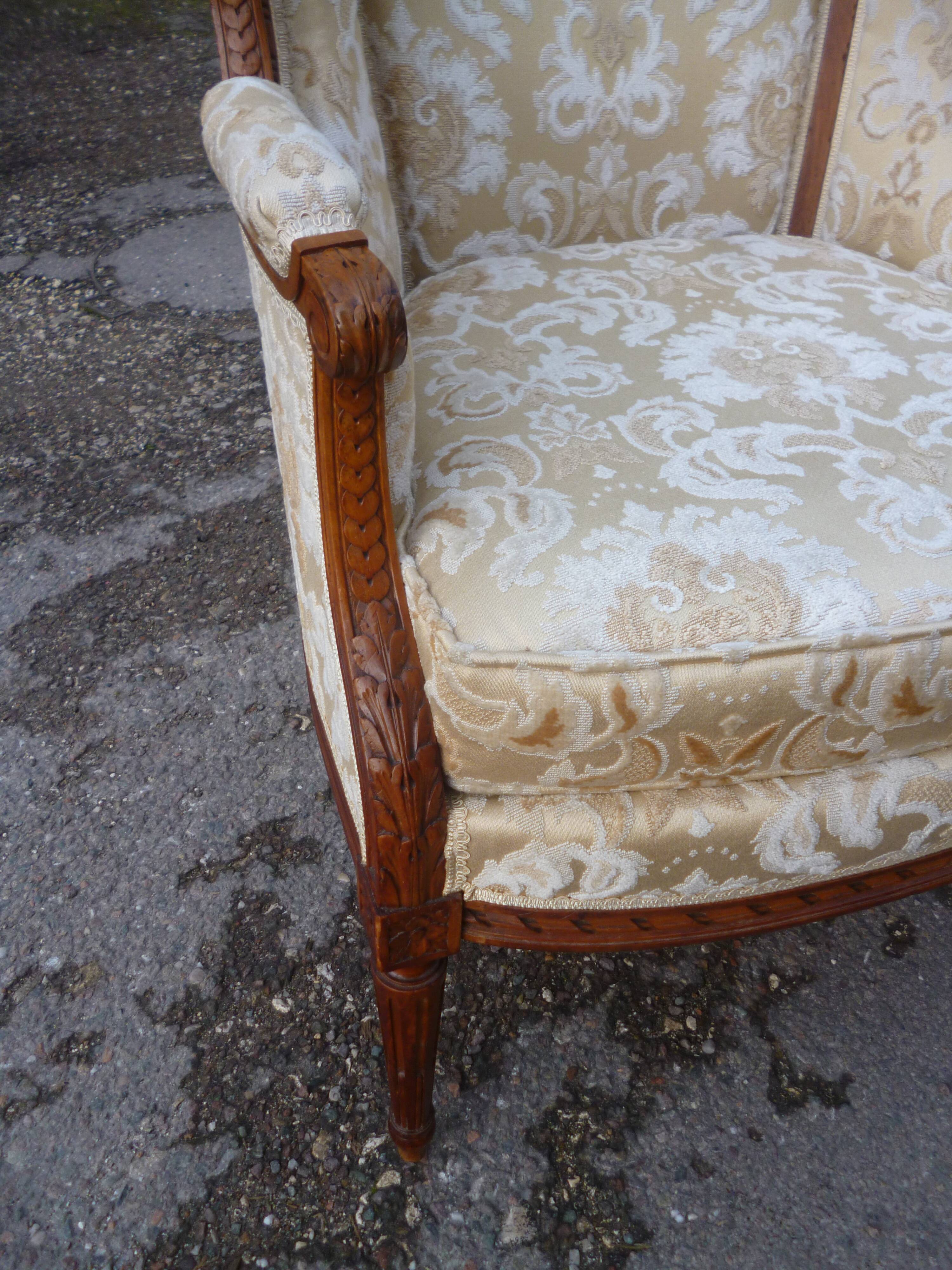 Pair of Louis XVI style armchairs with ears