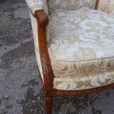 Pair of Louis XVI style armchairs with ears