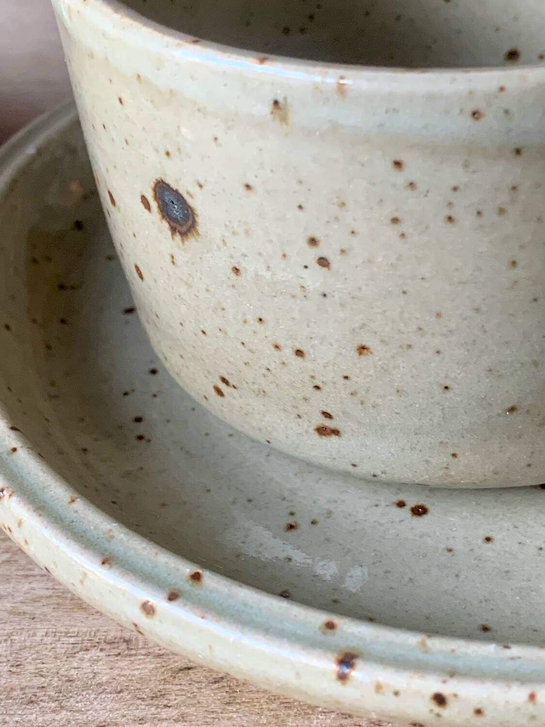 Two large Jean Austruy stoneware cups and saucers