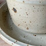 Two large Jean Austruy stoneware cups and saucers