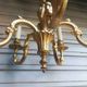 Antique gilded bronze chandelier in Louis XVI style, 5 lights, in working condition.