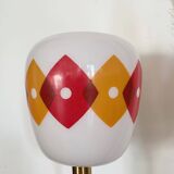 Table lamp with a vintage orange and red "Jacquard" globe in white glass and a golden base