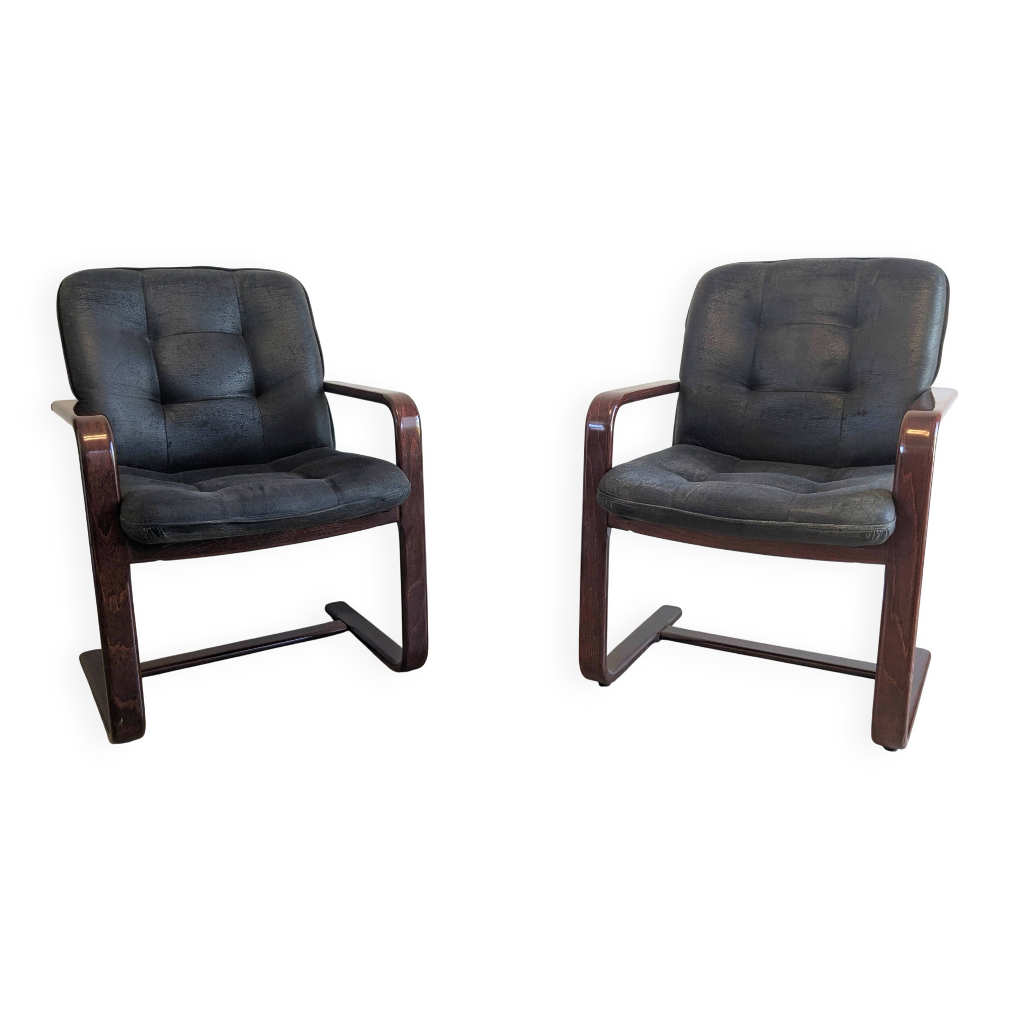 Pair of vintage cantilever armchairs in rosewood veneer.
