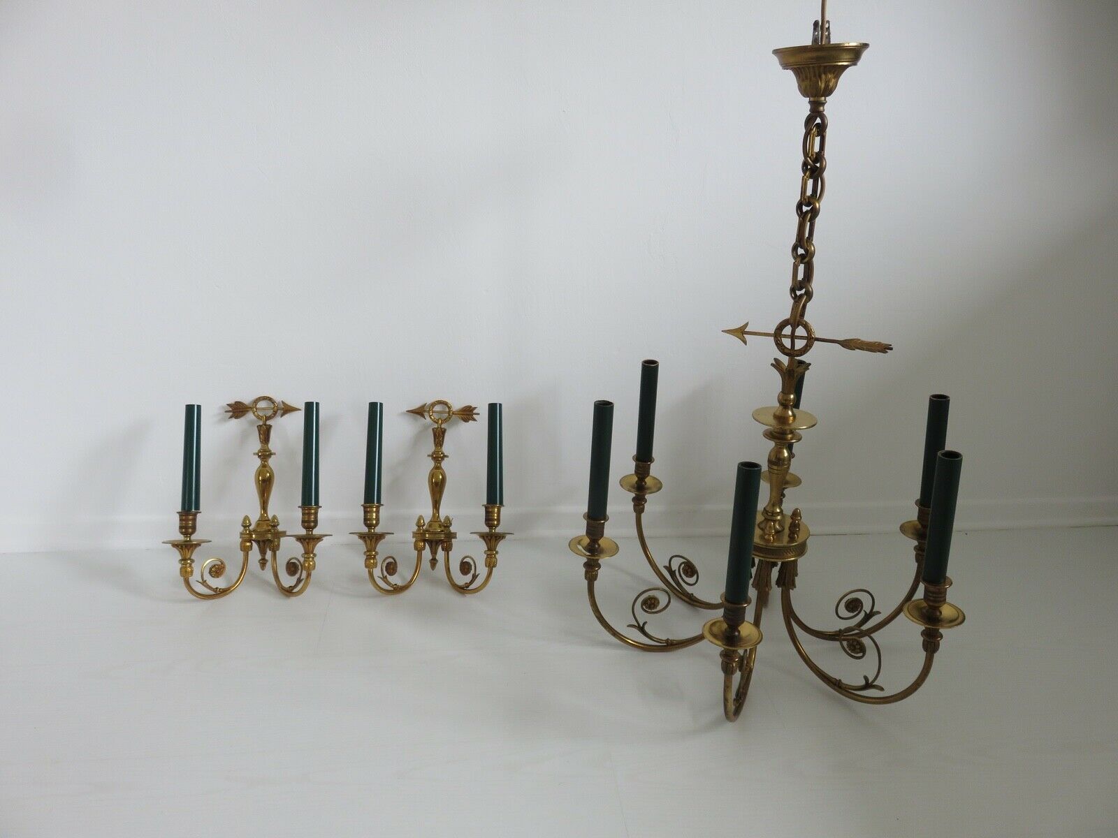 Pair of double wall lamps directoire style Lucien Gau in solid bronze gilded with bright gold