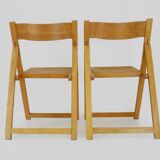 Pair of vintage folding chairs in beech and canework. Italy 70s