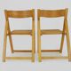 Pair of vintage folding chairs in beech and canework. Italy 70s