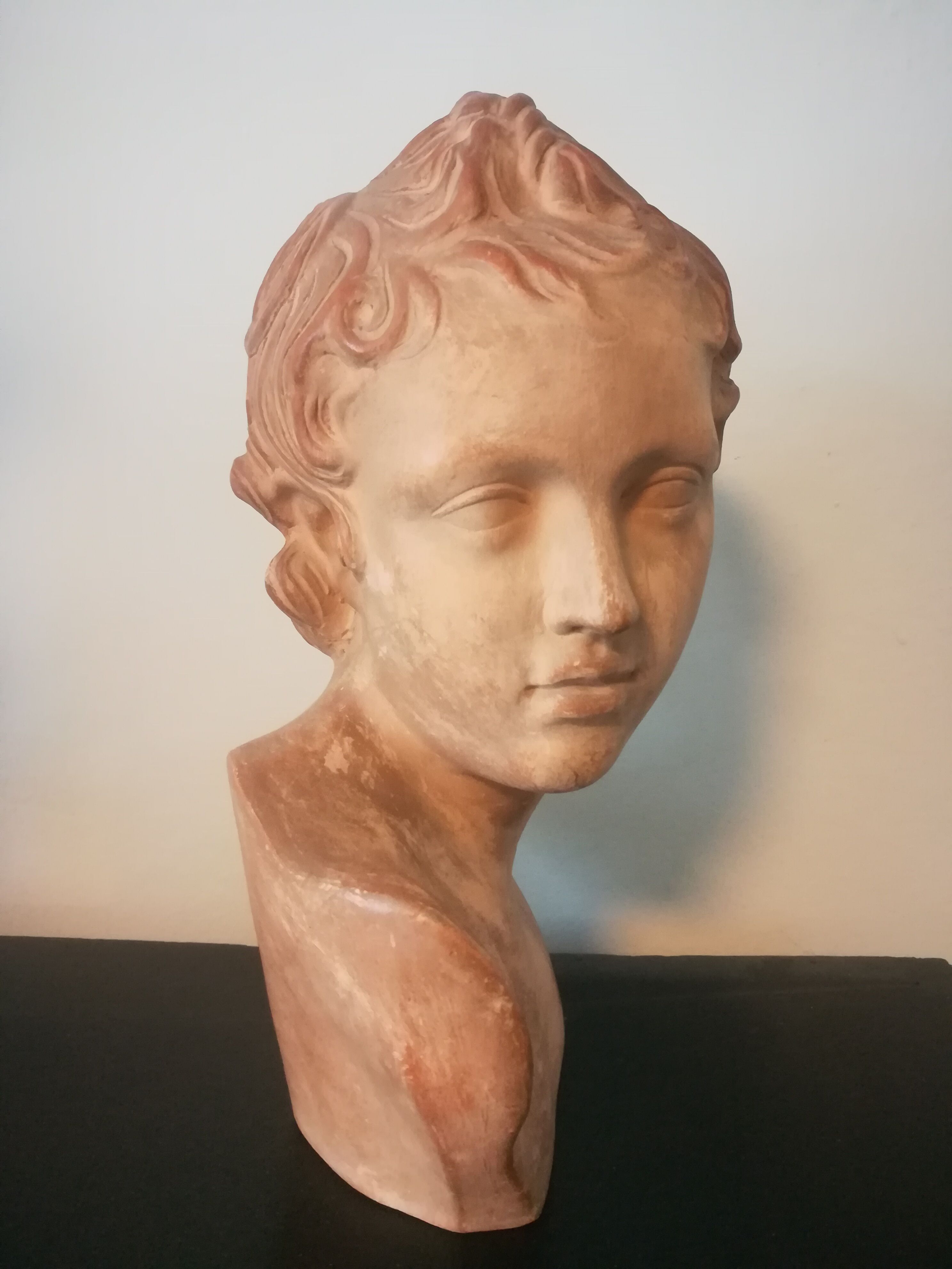 Children's bust in terracotta