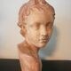 Children's bust in terracotta