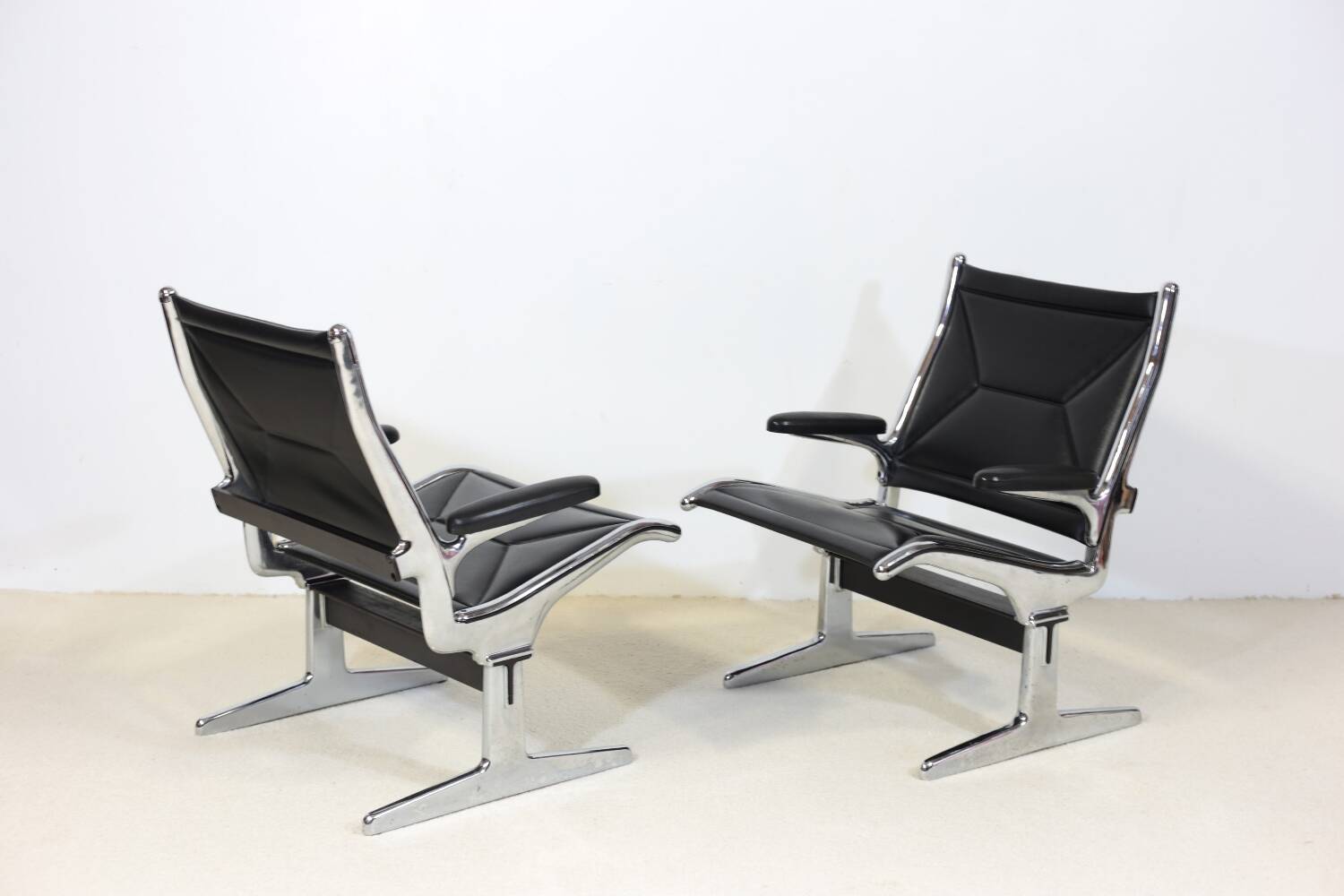 Pair of Eames Sling Tandem armchairs