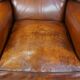 Sheepskin leather wingback chair with patina