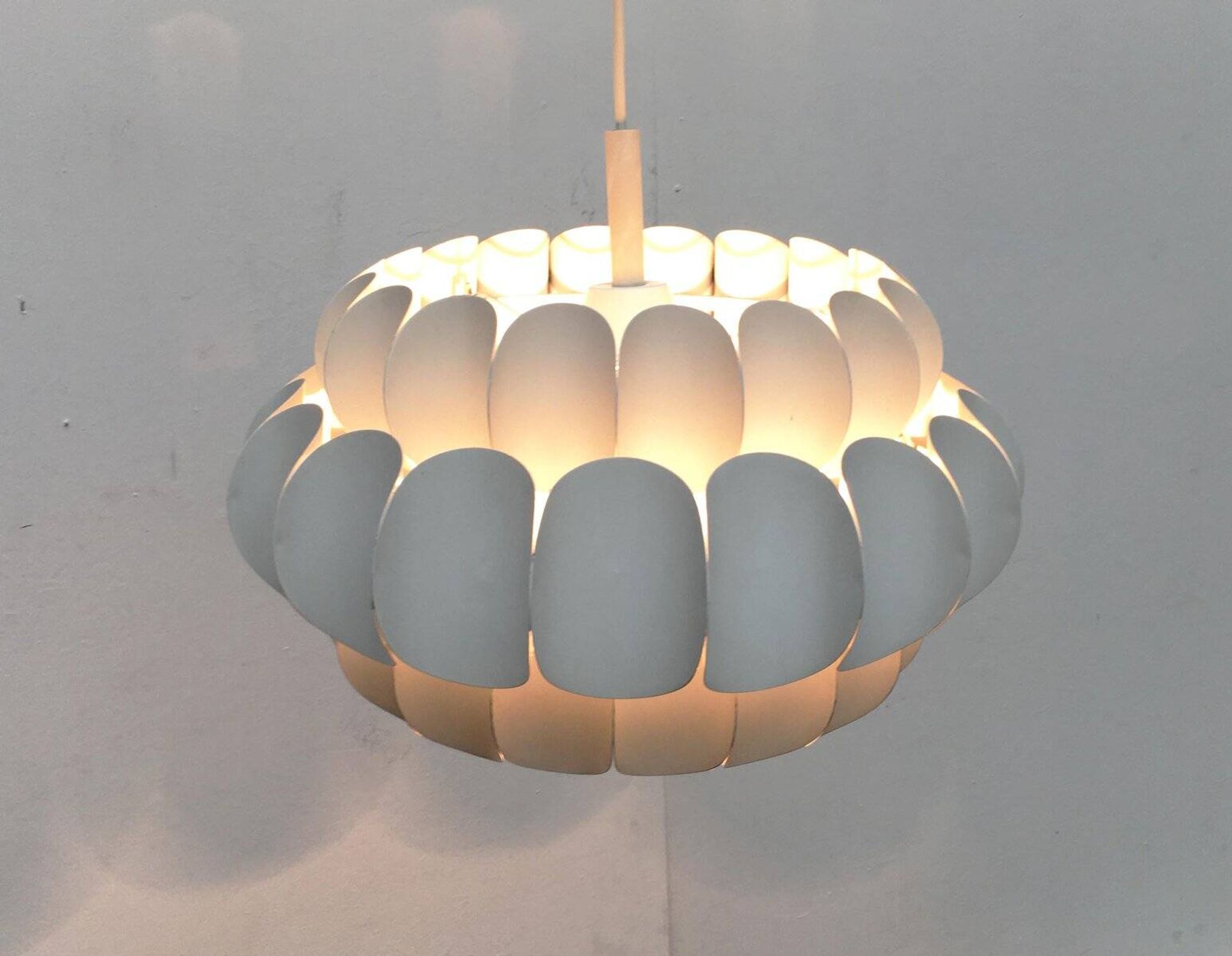 Mid-century white metal Swiss suspension by H. Zender for Temde.