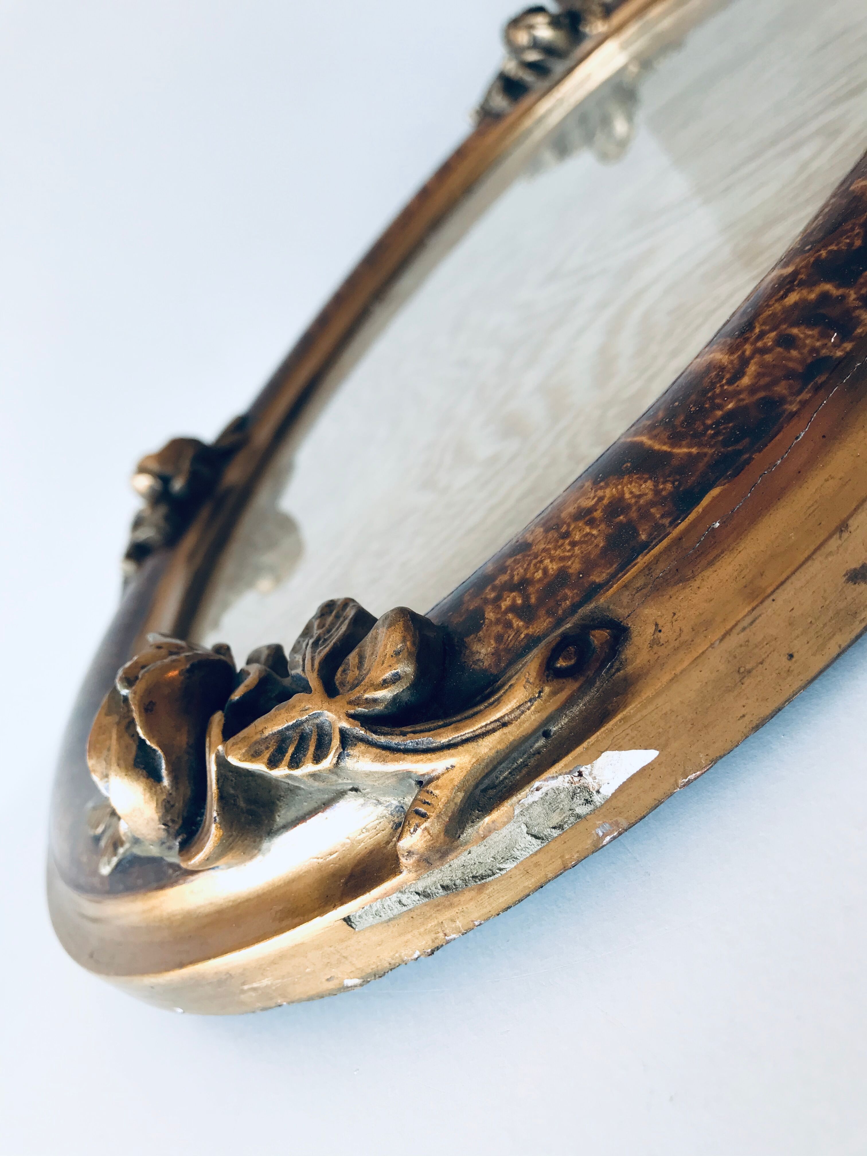 Golden old oval frame