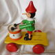 Pinocchio drum, wooden pull toy