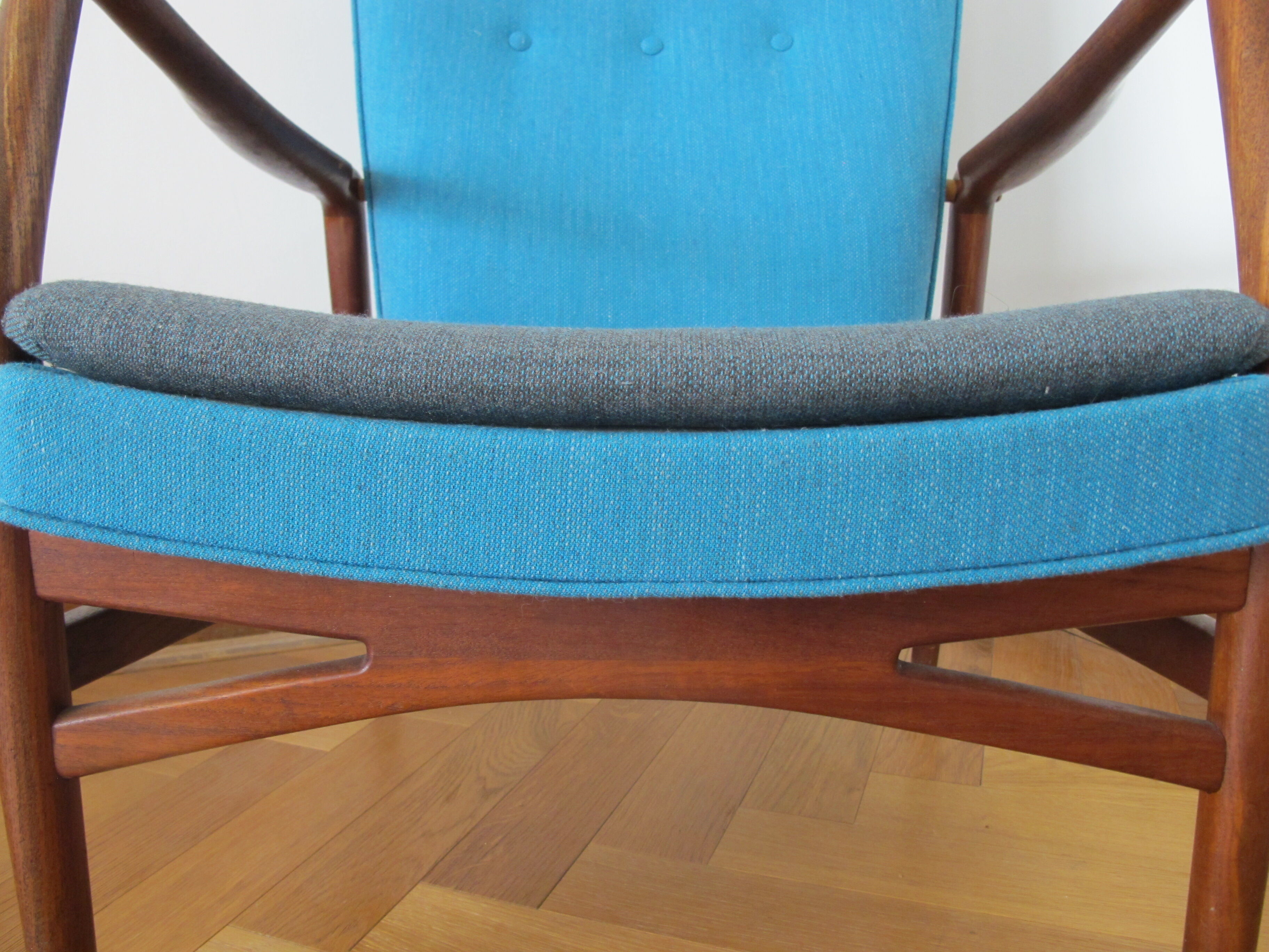 Tall back chair by Kurt Olsen