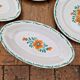 Lot de 7 assiettes plates plus de raviers